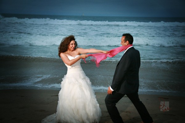 Trash the beach session at Venice Beach, CA with bride and groom