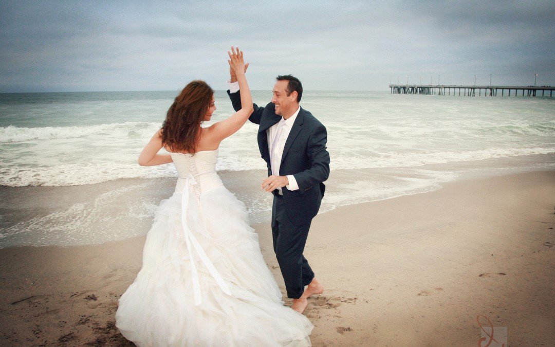 bride and groom at Venice beach, CA