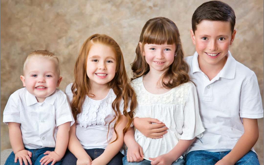 4 children in a portrait