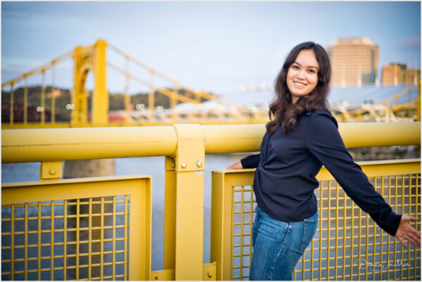 Young woman on bridge in Pittsburgh, PA