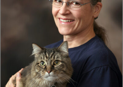 Portrait of a woman and her cat