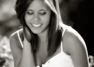 Senior girl smiling and looking down