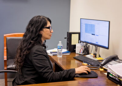 Woman at computer working in a law office