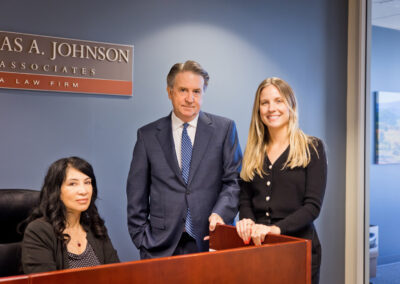 Lawyer and Assistants in his office